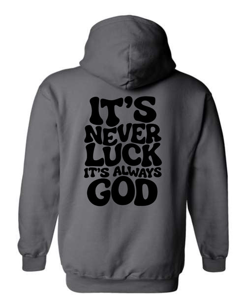 Charcoal It's Never Luck It's Always God hoodie with black lettering across the back